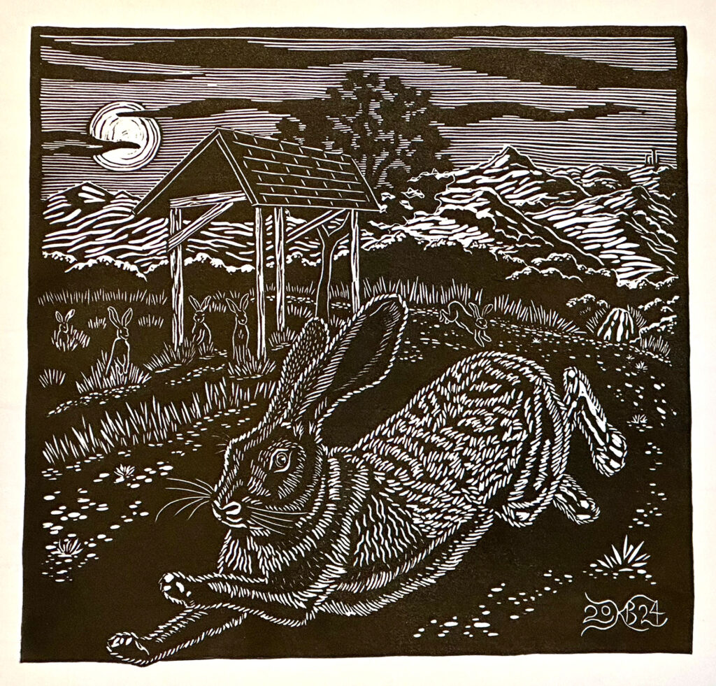 linocut of wild rabbit running past a regional park info kiosk in the foreground, with more rabbits standing still in the background looking on. There's a full moon in the night sky against a backdrop of the east bay hills in Fremont California, including Mission Peak.